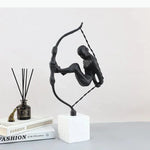 Sculpture moderne tête tête noir blanc socle pierre bouteille diffuseur livresscrição