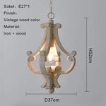 suspension lumineuse bois ornements sculptés finition rustique classique vintage blanc beige salle manger restaurant
