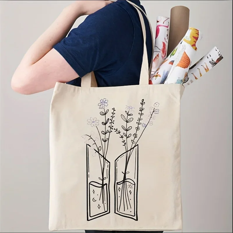 sac main toile beige motif floral ouvert minimaliste poignées fourre tout décontracté