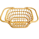 panier rotin tressé naturel coussin couverture boules pin couronne fleurs