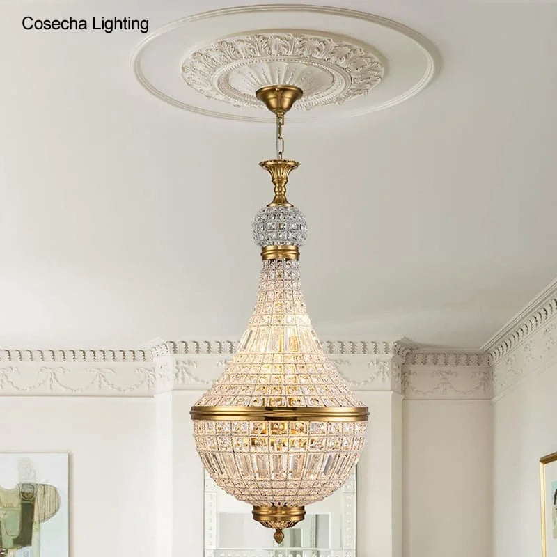 suspension lumineuse cristal dorée élégante classique brillants transparents chambre salon