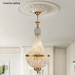 suspension lumineuse cristal dorée élégante classique brillants transparents chambre salon