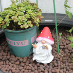 statue gnome jardin fée doigt milieu champignon résine couleurs vives décoration extérieure patio lawn