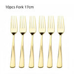 vaisselle jetable moderne assiettes bleu marine fourchette cuillère nappe dorée points festif