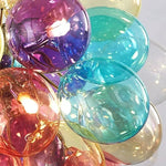 suspension lumineuse moderne transparente boules colorées violet bleu vert orange rose blanc