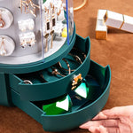 boîte bijoux rotative moderne vert foncé gris clair matériau plastique rangement bijoux adhésif boucles