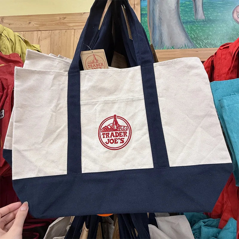 sacs toile colorés blanc vert violet rouge jaune logo trader joes poignées tissu casual
