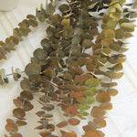 guirlande feuilles artificielles décoration intérieure vase verre bouquet fleurs séchées naturel minimaliste vert foncé