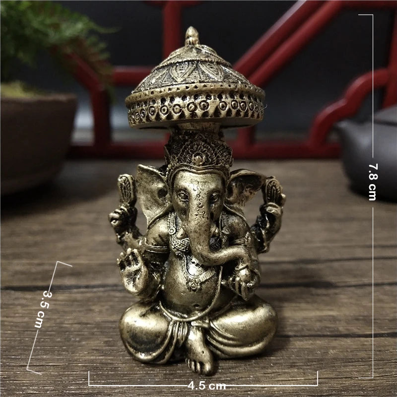 statue ganesha dorée résine ornements complexes décoration intérieure artisanale traditionnelle bouddhiste éléphant multiple bras