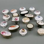 boutons meuble céramique blanc or noir fleurs poissons géométriques classiques