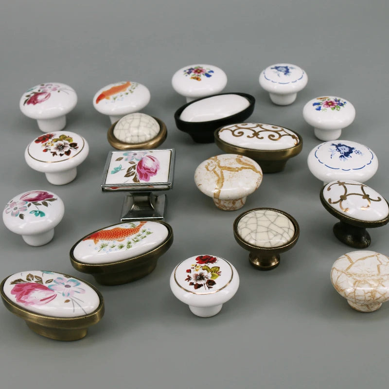 boutons meuble céramique blanc or noir fleurs poissons géométriques classiques