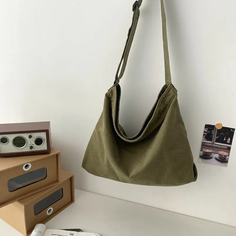 sac bandoulière vert olive toile coton minimaliste fermeture éclair polyvalent fourre tout décontracté homme