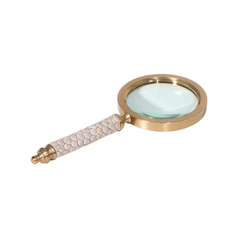 décoration vintage loupe or marron poignée cuir serpent transparente élégante maison