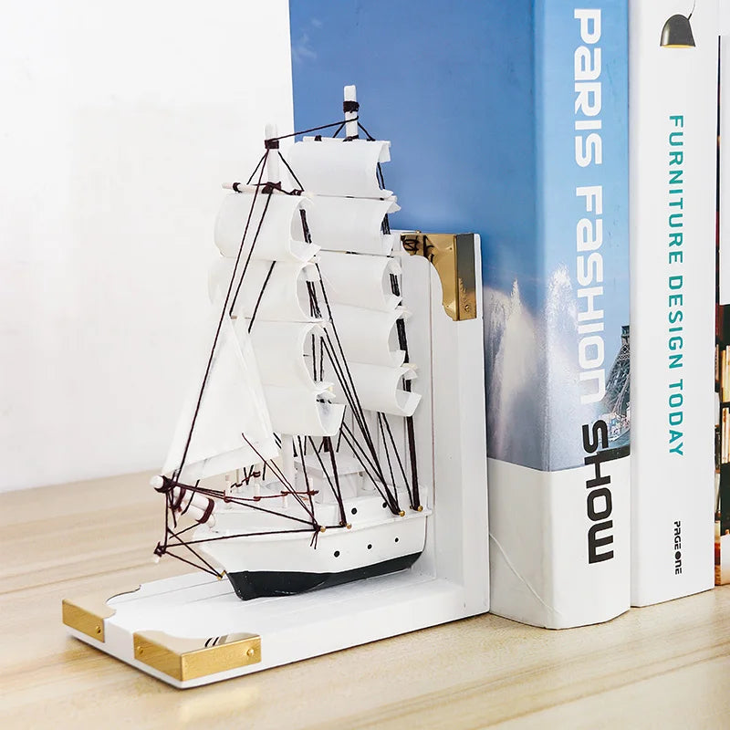 support livres bateau voiles transparentes clips dorés moderne décoratif noir blanc