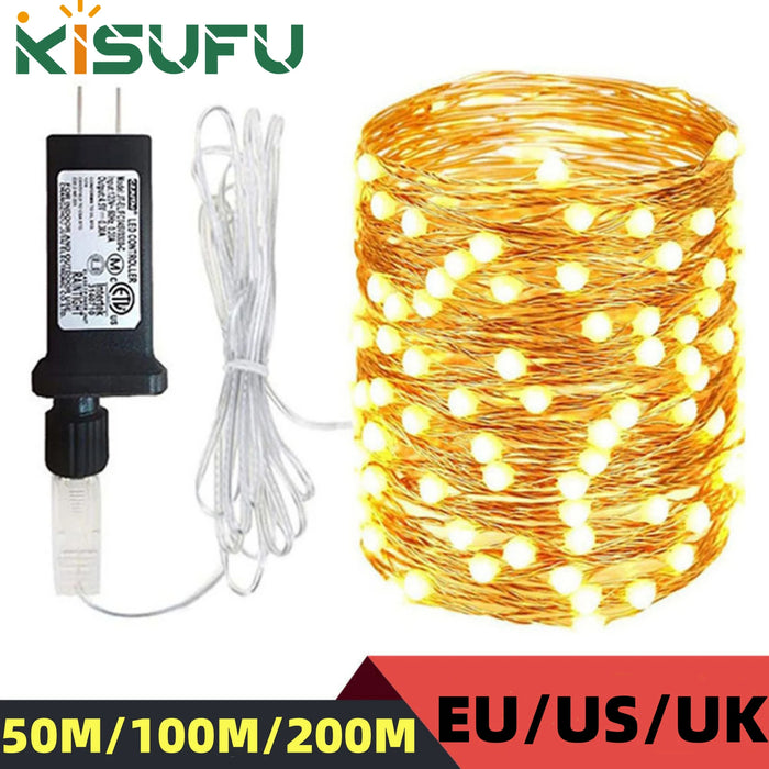 Guirlande lumineuse LED 100m blanc chaud dans un jardin