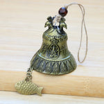 cloche décorative artisanale bronze relief floral animaux symboles chaîne poisson fixations murales vintage