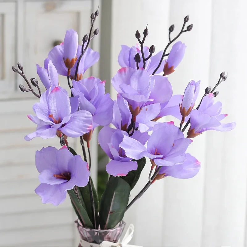bouquet orchidées artificielles rouge blanc violet feuilles vertes moderne élégant intérieur mariage anniversaire