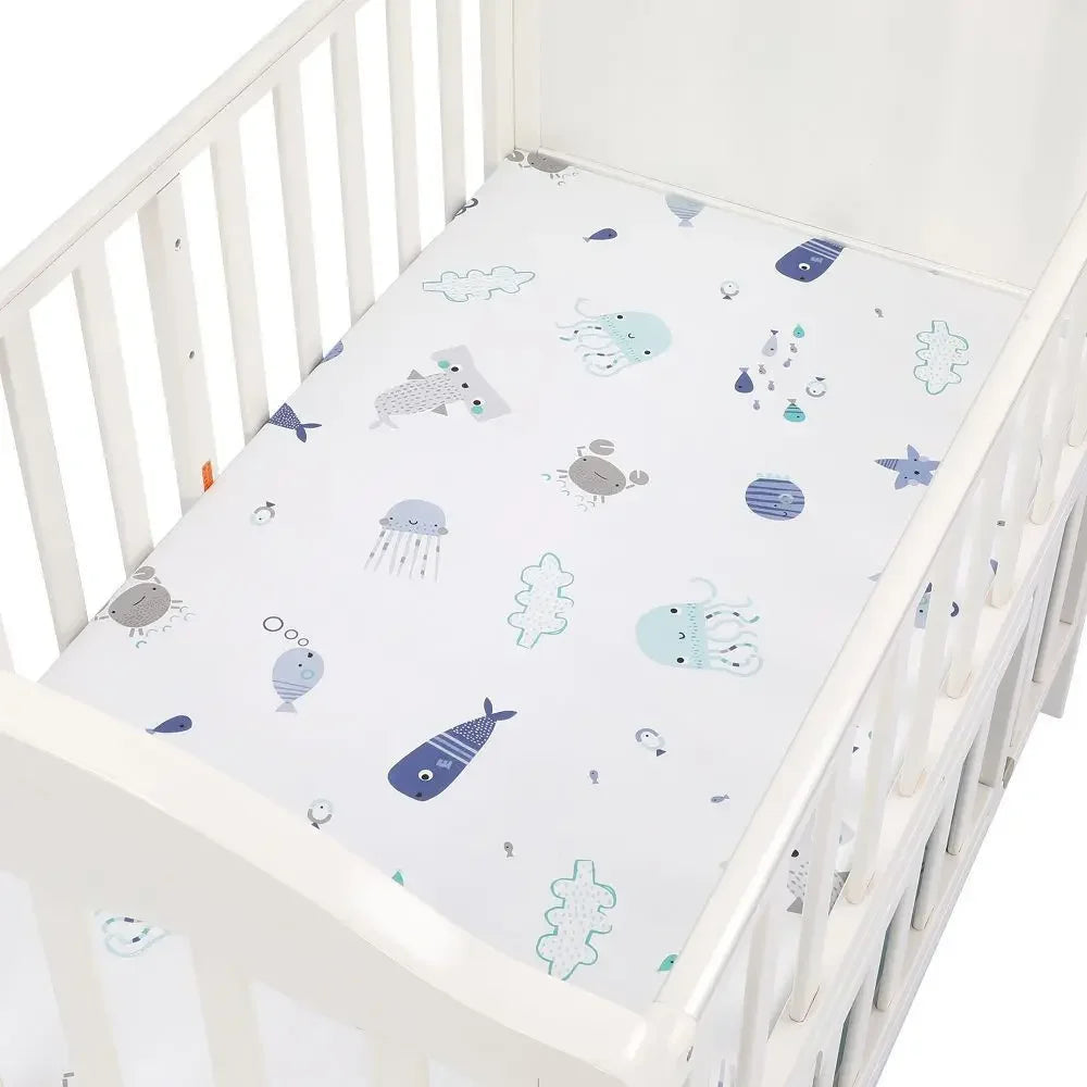 drap housse lit bébé motif animaux poissons éléphants cœurs couleurs multiples blanc bleu gris