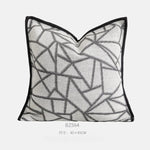 taies d'oreiller géométriques coton lin blanc gris beige modernes élégantes carrées