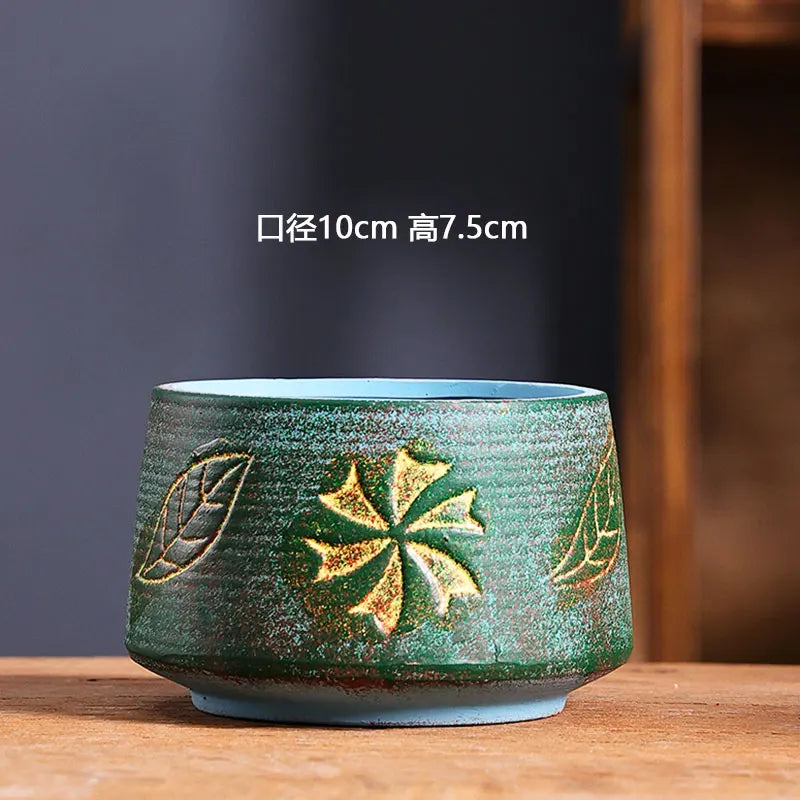 cache pot céramique artisanal méditerranéen couleurs vives motifs texturés plante verte intérieur moderne