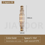 applique murale moderne cristal doré tubes horizontaux lumière led salon luxe élégant