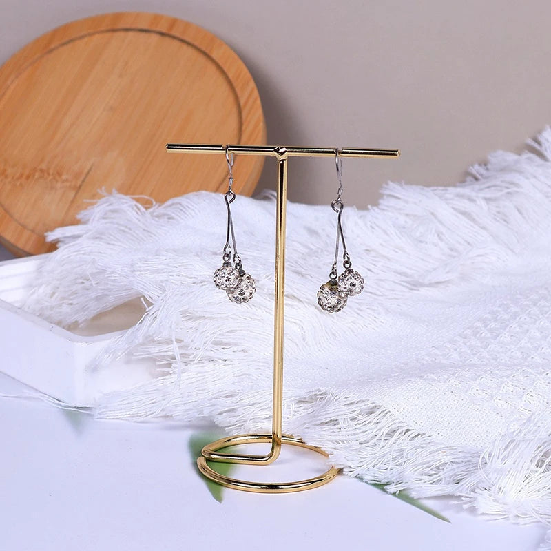 présentoir bijoux métal doré velours blanc rangement boucles oreilles colliers exposants boutique bijouterie professionnel