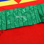 rideau tibétain brodé motifs géométriques tissu coloré jaune rouge vert bleu blanc orange