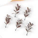 feuilles artificielles vertes naturelles minimaliste décoration extérieure événement célébration mariage