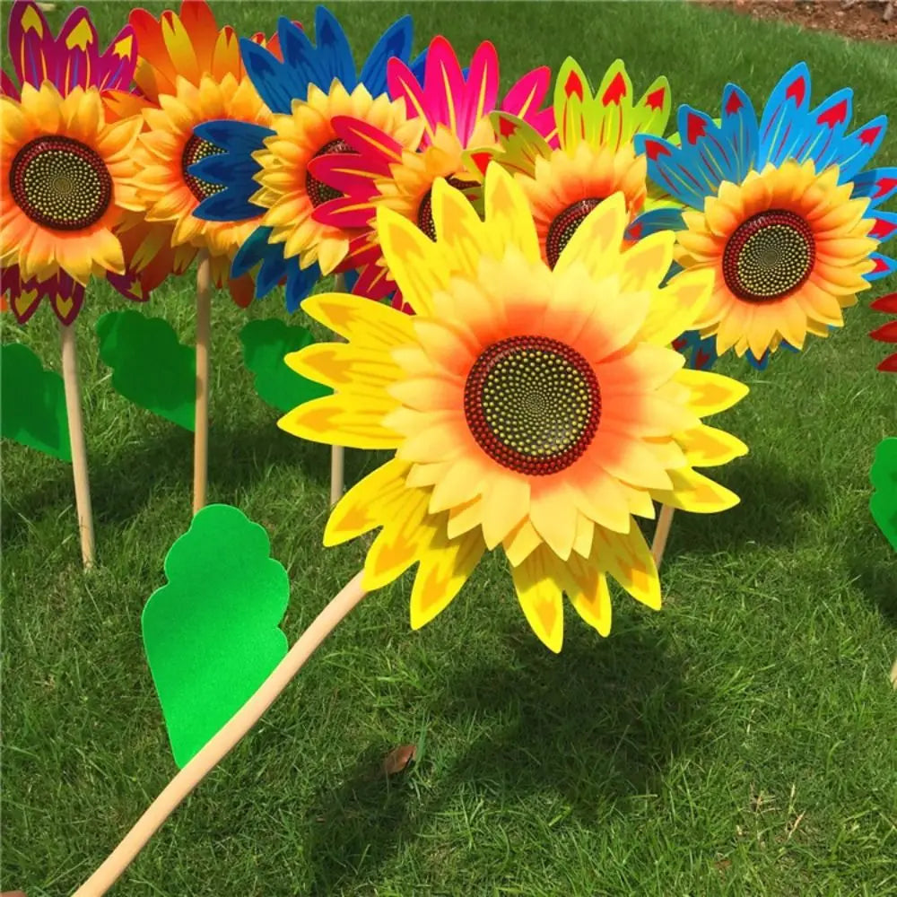 décoration extérieure fleur artificielle jaune rouge bleu vert rayonnante pétale verte tringle jardin cour