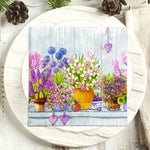 serviettes papier serviettes florales motif fleurs pots arrière plan bois rose violet bleu jaune