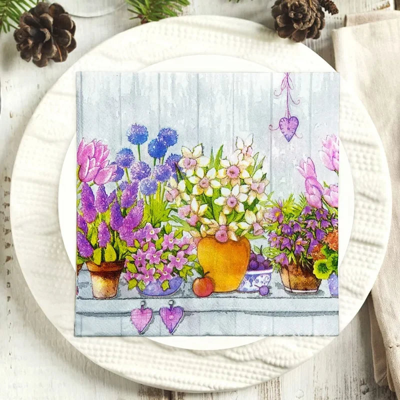 serviettes papier serviettes florales motif fleurs pots arrière plan bois rose violet bleu jaune