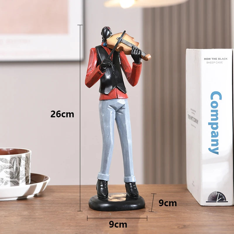 statues miniatures musiciens guitare saxophone trombone batterie décoration intérieure moderne stylisée