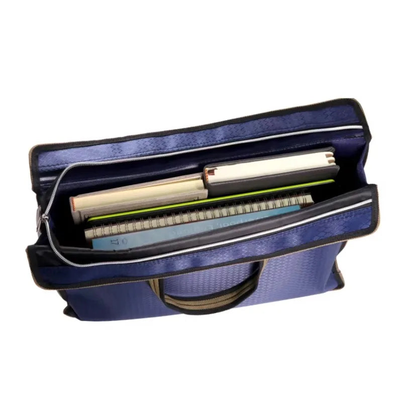 sac main moderne bleu géométrique poignées métalliques carnet stylo papier ruban