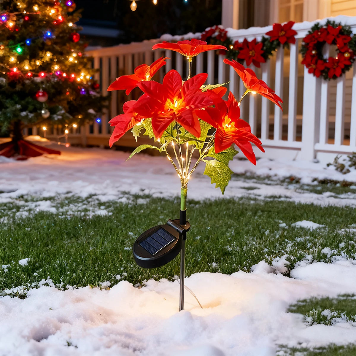 Détail de la fleur artificielle poinsettia avec éclairage LED solaire
