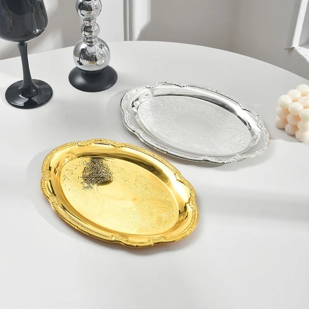 assiettes ovales or argent ornées motifs floraux classique baroque plateaux service vintage