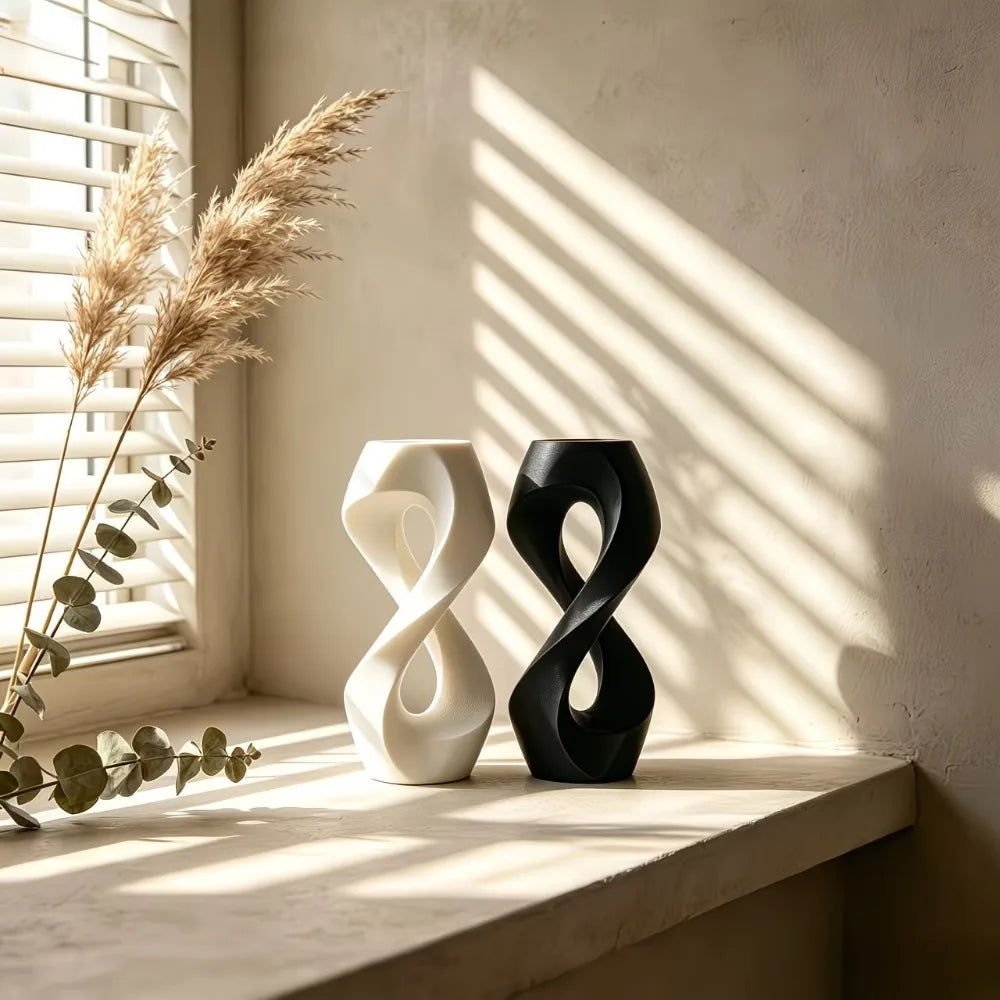 décoration intérieure moderne vase blanc noir sculpture minimaliste torsadé abstraite table centro