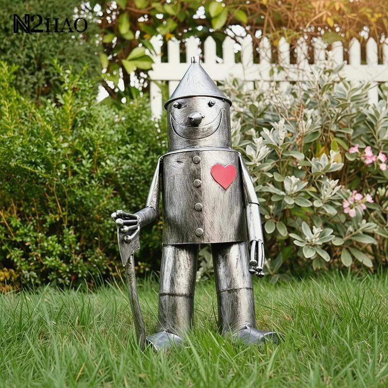 statue jardin résine robot argenté texture vintage souriant hache coeurs éléments