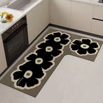 tapis cuisine noir fleurs stylisées moderne imperméable antidérapant polypropylène PVCintérieur sèche rapidement