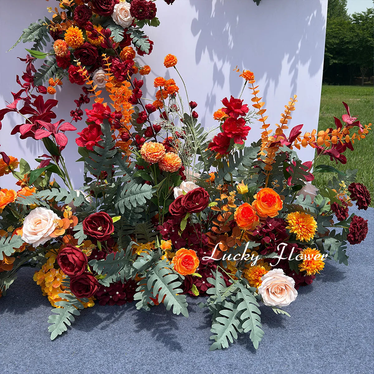 décoration mariage arche fleurs artificielles rouge orange intérieur champêtre anniversaire baby shower
