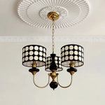 lampe suspendue moderne points blancs fond noir chaîne suspension salon manger led designintérieur