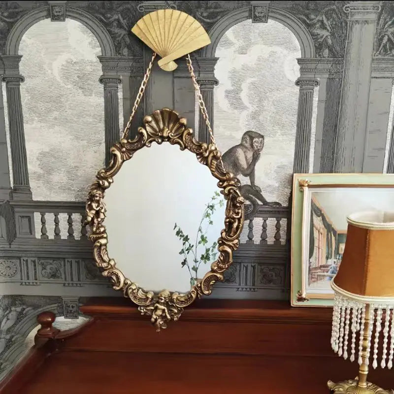miroir baroque doré ornements sculptés anges chaines decoration maison accessories français