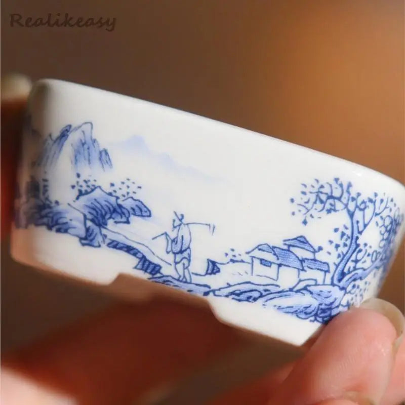 bol traditionnel décoré fruits pommes paysage motifs ondulés blanc orange bleu
