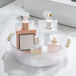 organisateur cosmétiques transparent moderne poignées dorées flacons lotion parfum crème nettoyant sérum baume moussant