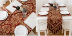 table luxe brodée motifs floraux rouge bordeaux or beige festive rich textureFRINGES