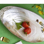 assiette ovale motifs floraux ornementations multicolores classique élégant fruits décoratif blanc table manger