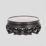 support bois sculpté motifs floraux artisanal decor maison marron foncé tranchant deco vase pot