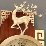 horloge murale or marron motif géométrique asiatique cadran analogique LED figurine cerf métal doré