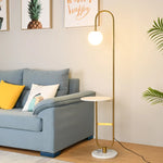 lampe sol moderne or marbre blanc plateau métal minimaliste