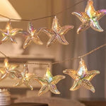 décoration intérieure guirlande lumineuse étoile mer coquillage thème marin festif anniversaire noël
