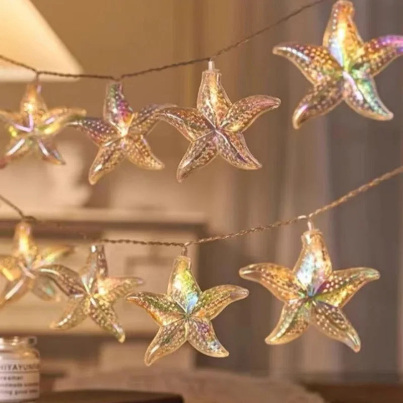 décoration intérieure guirlande lumineuse étoile mer coquillage thème marin festif anniversaire noël